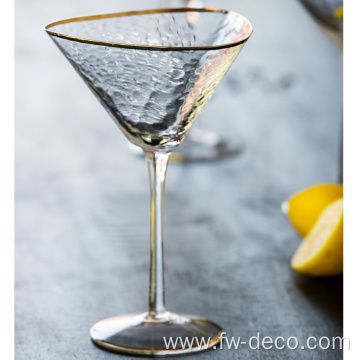 organic cocktail martini glass with gold rim